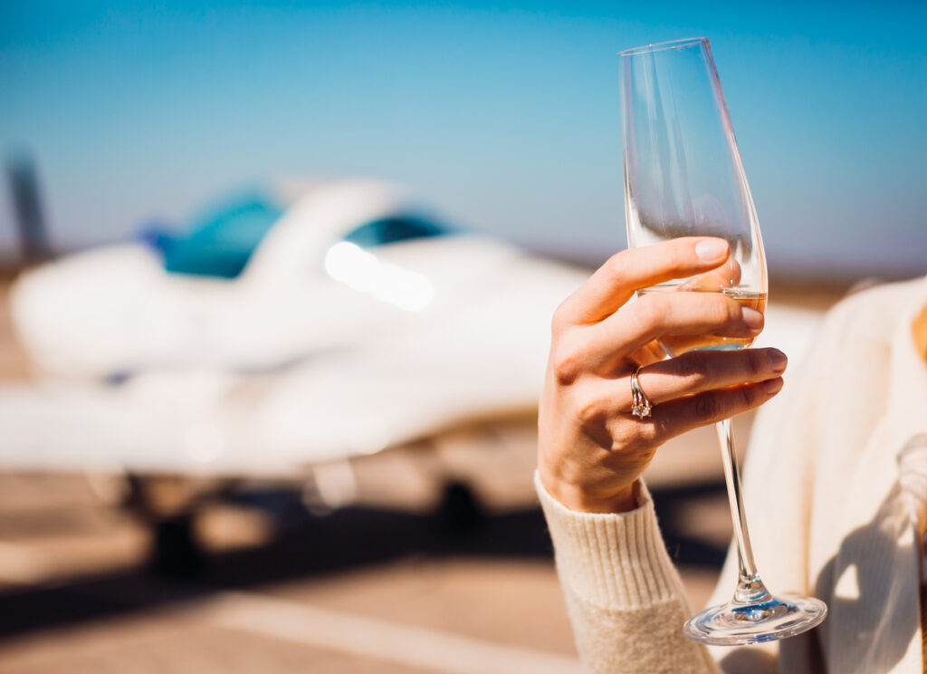 Woman on a wine tour holding a glass of wine